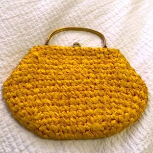 Vintage hand crochet purse. Yellow fabric and gold hardware.